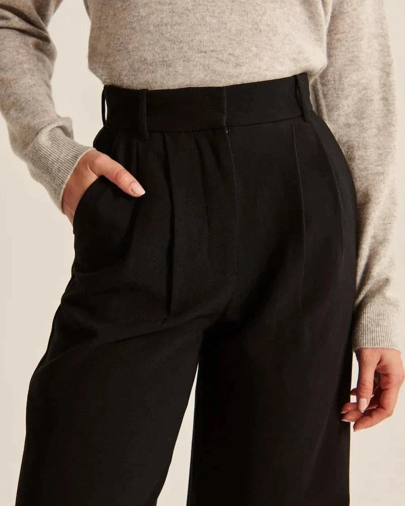 Pantalon large femme beige, taille haute, coupe élégante et confortable, allonge les jambes, idéal pour toutes occasions.