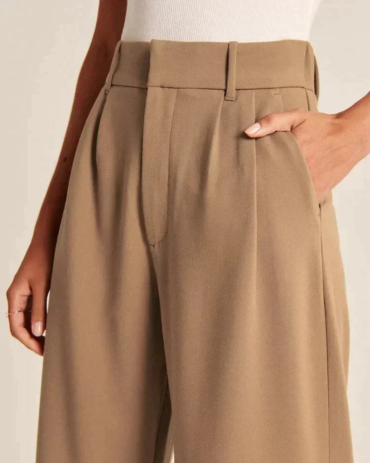 Pantalon large femme beige, taille haute, coupe élégante et confortable, allonge les jambes, idéal pour toutes occasions.