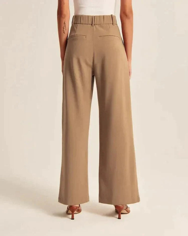 Pantalon large femme beige, taille haute, coupe élégante et confortable, allonge les jambes, idéal pour toutes occasions.