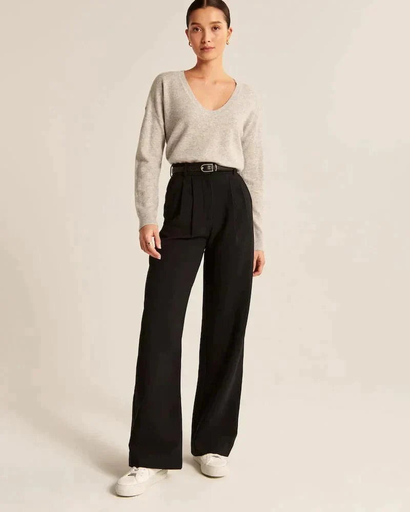 Pantalon large femme beige, taille haute, coupe élégante et confortable, allonge les jambes, idéal pour toutes occasions.