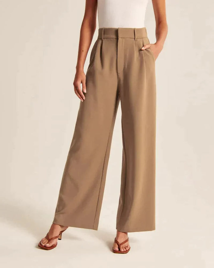 Pantalon large femme beige, taille haute, coupe élégante et confortable, allonge les jambes, idéal pour toutes occasions.