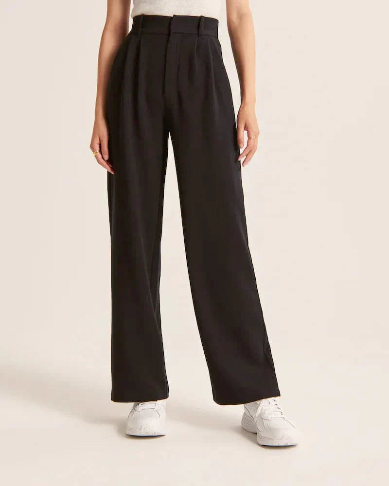 Pantalon large femme beige, taille haute, coupe élégante et confortable, allonge les jambes, idéal pour toutes occasions.