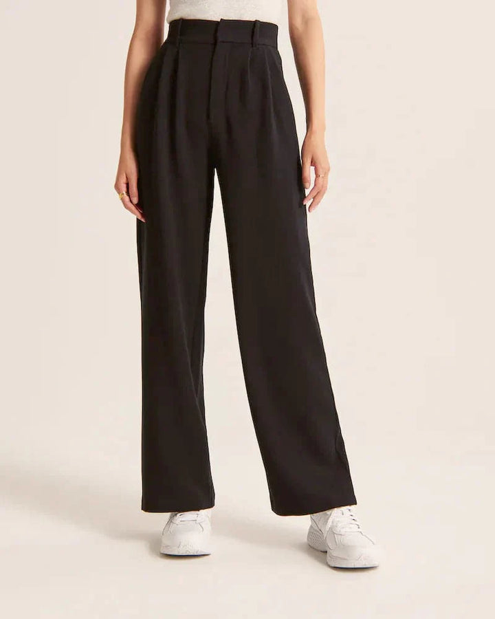 Pantalon large femme beige, taille haute, coupe élégante et confortable, allonge les jambes, idéal pour toutes occasions.