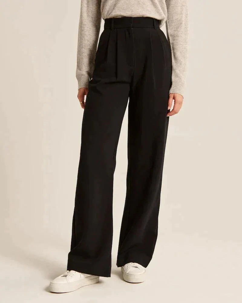 Pantalon large femme beige, taille haute, coupe élégante et confortable, allonge les jambes, idéal pour toutes occasions.