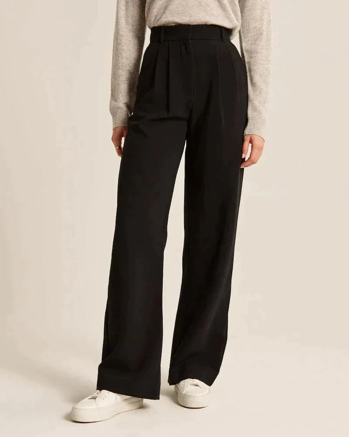 Pantalon large femme beige, taille haute, coupe élégante et confortable, allonge les jambes, idéal pour toutes occasions.