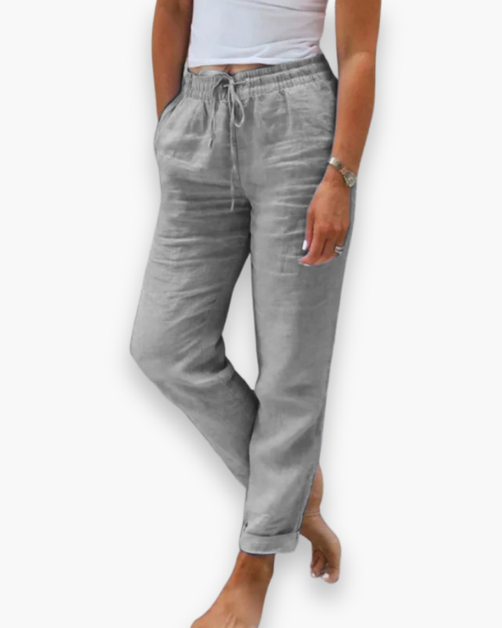 "Pantalon léger femme fluide, taille élastique, tissu doux, poches pratiques, parfait pour style chic décontracté quotidien."