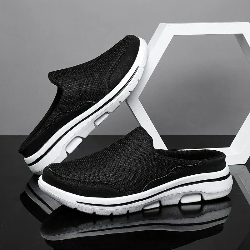 "Pantoufles homme luxueuses, respirantes et élégantes en coton mélangé, avec design ergonomique pour confort optimal."