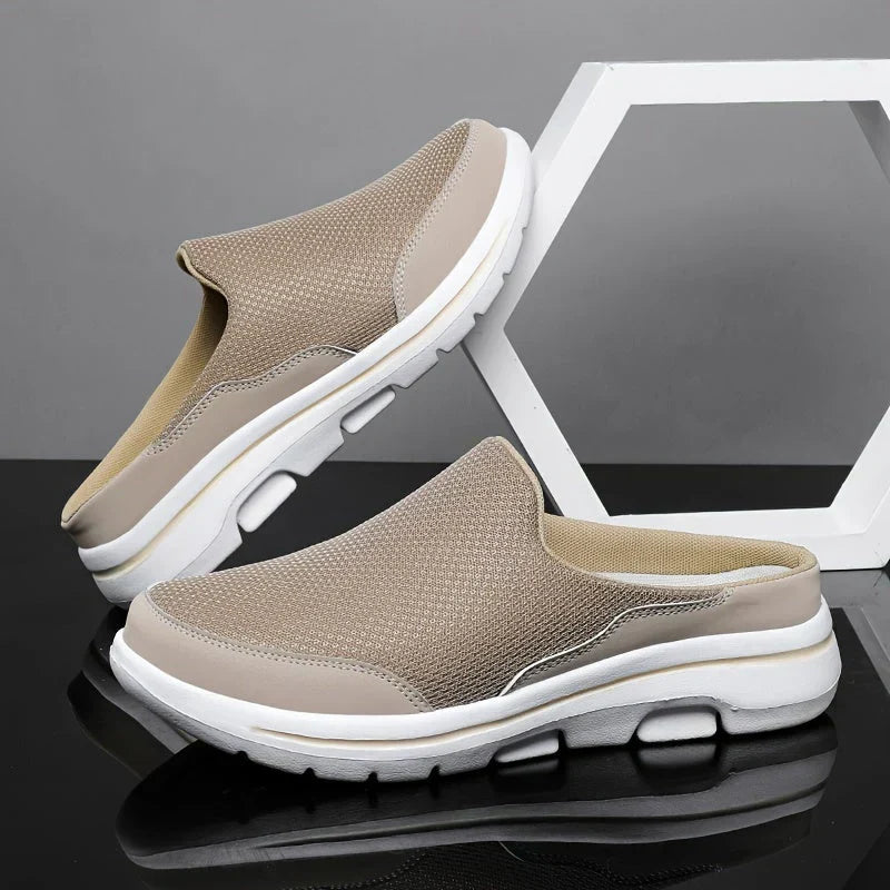 "Pantoufles homme luxueuses, respirantes et élégantes en coton mélangé, avec design ergonomique pour confort optimal."