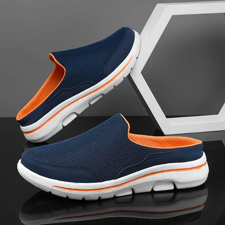 "Pantoufles homme luxueuses, respirantes et élégantes en coton mélangé, avec design ergonomique pour confort optimal."