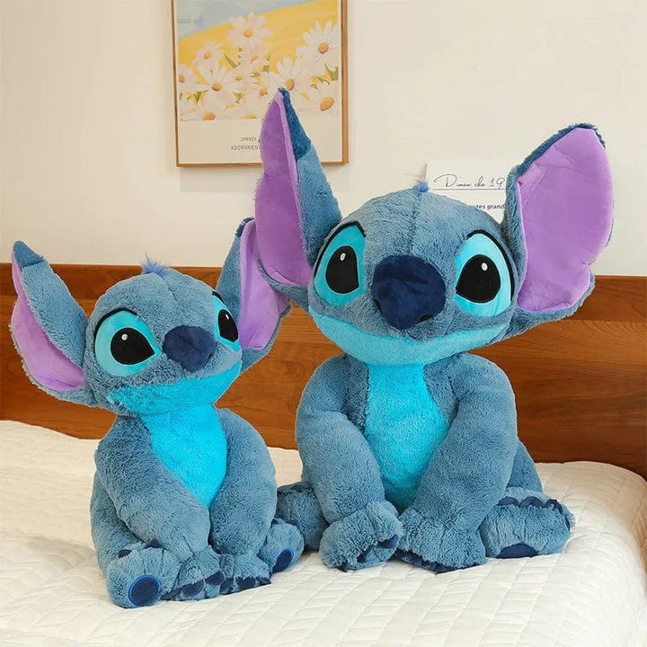 "Peluche douce Stitch avec texture moelleuse, idéale pour enfants, en bleu ou rose, parfaite pour des câlins et rêves enchant