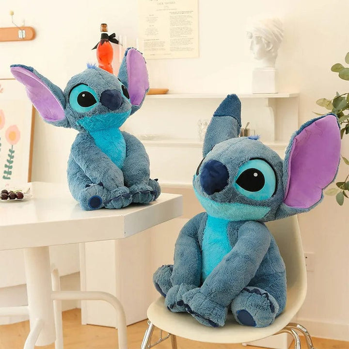 "Peluche douce Stitch avec texture moelleuse, idéale pour enfants, en bleu ou rose, parfaite pour des câlins et rêves enchant