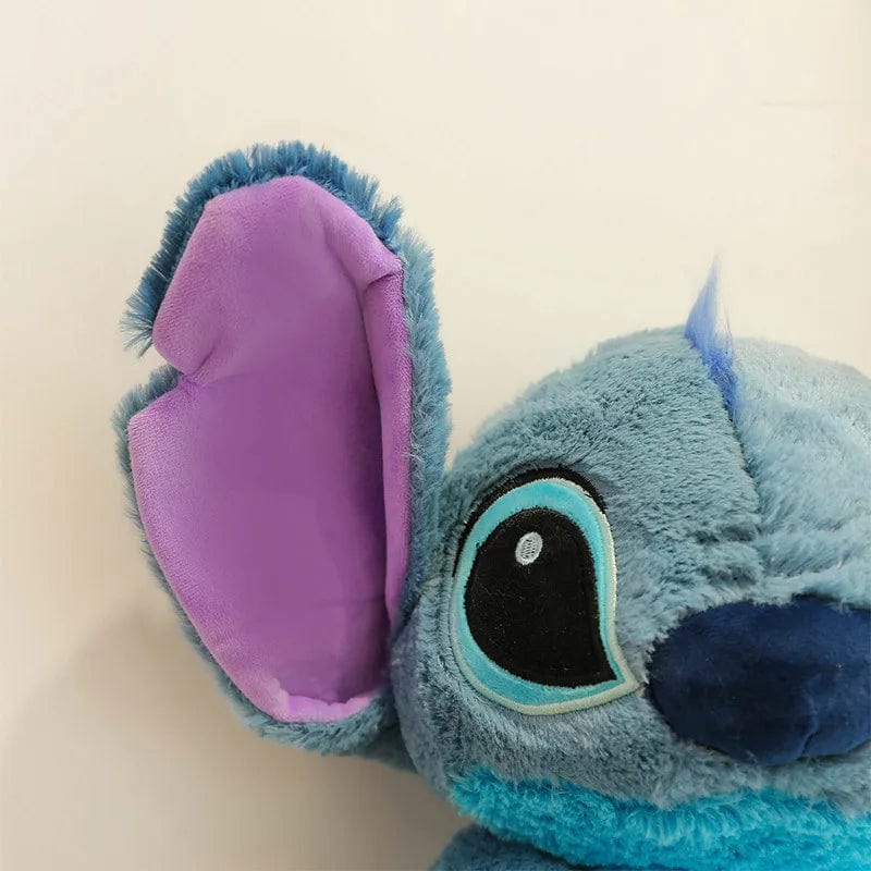 "Peluche douce Stitch avec texture moelleuse, idéale pour enfants, en bleu ou rose, parfaite pour des câlins et rêves enchant