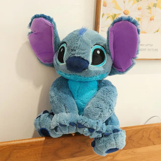 "Peluche douce Stitch avec texture moelleuse, idéale pour enfants, en bleu ou rose, parfaite pour des câlins et rêves enchant