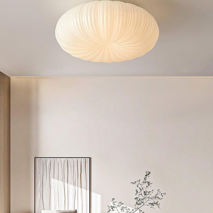 "Plafonnier LED en métal et acrylique, design moderne, lumière ajustable avec télécommande, élégant et contemporain."