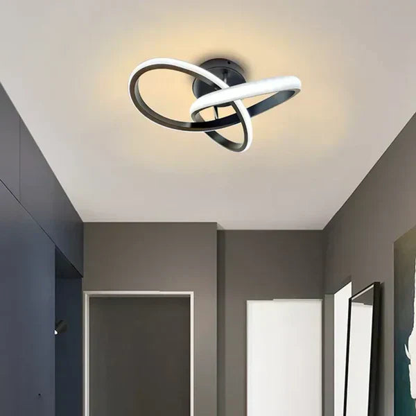 "Plafonnier LED moderne rond blanc, design épuré, éclairage écoénergétique idéal pour décoration contemporaine."