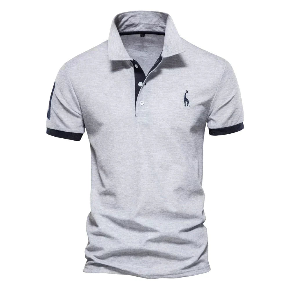 "Polo homme classique, coupe ajustée, patte boutonnage élégante, tissu respirant pour confort et style intemporel."