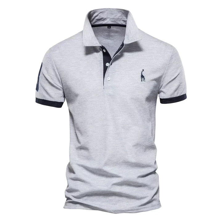 "Polo homme classique, coupe ajustée, patte boutonnage élégante, tissu respirant pour confort et style intemporel."