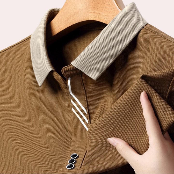 Polo homme manches longues décontracté, couleur noire, en tissu respirant, idéal pour un style casual chic.