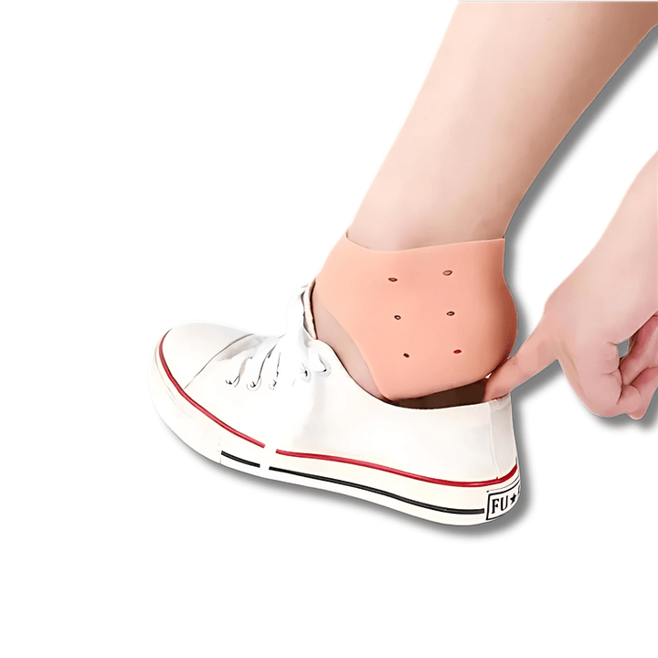 "Protège talon silicone transparent flexible, vue de dessus, accessoire confort pour femmes, adaptable à toutes chaussures"
