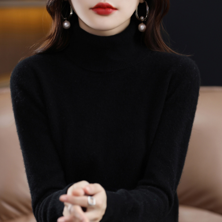 "Pull à col roulé en cachemire bleu pour femme, élégant et doux, ajout luxueux à toute tenue."