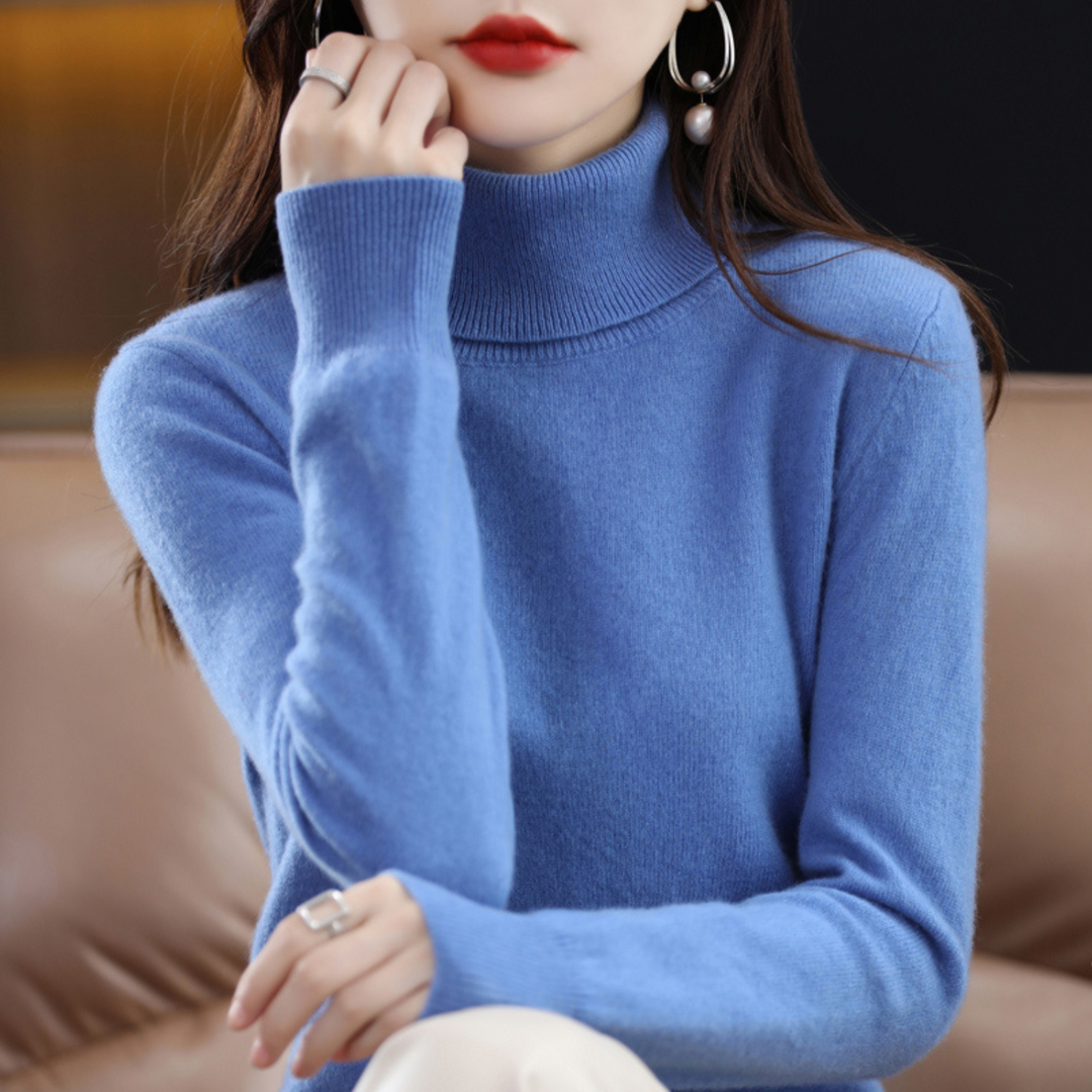 "Pull à col roulé en cachemire bleu pour femme, élégant et doux, ajout luxueux à toute tenue."