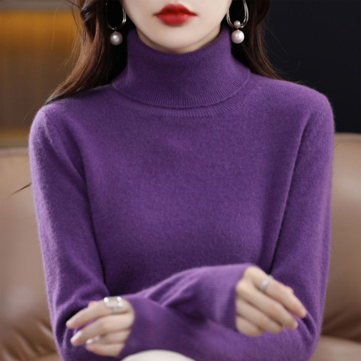 "Pull à col roulé en cachemire bleu pour femme, élégant et doux, ajout luxueux à toute tenue."