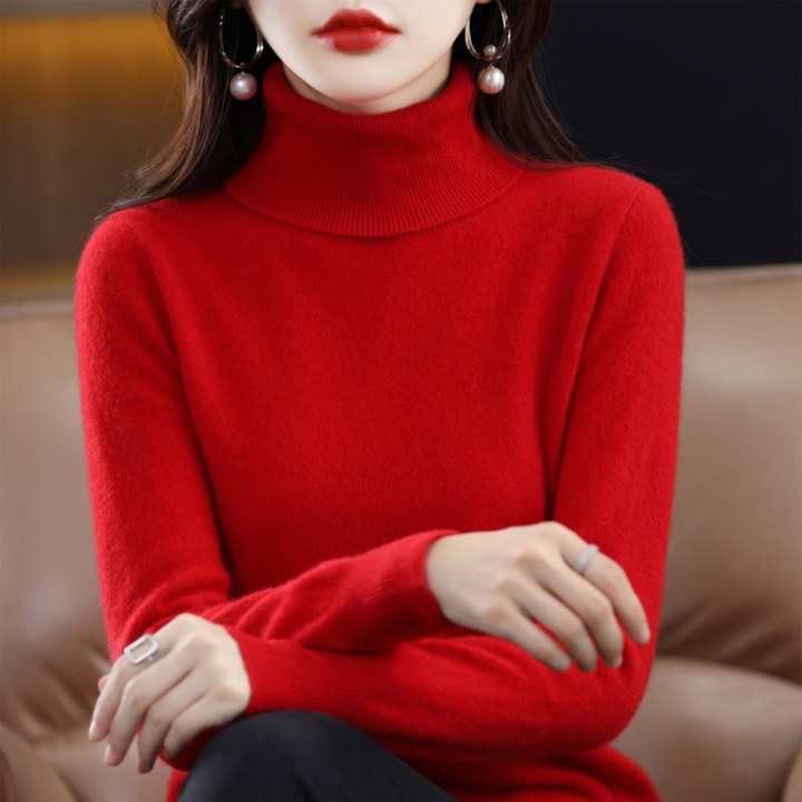 "Pull à col roulé en cachemire bleu pour femme, élégant et doux, ajout luxueux à toute tenue."