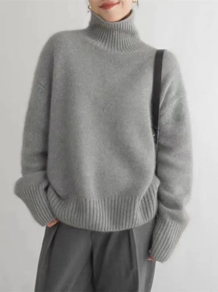 "Pull col roulé cachemire Joline, élégant et doux, parfait pour ajouter chaleur et style aux tenues d'hiver."