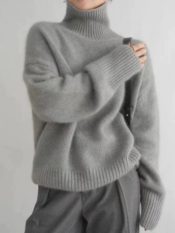 "Pull col roulé cachemire Joline, élégant et doux, parfait pour ajouter chaleur et style aux tenues d'hiver."