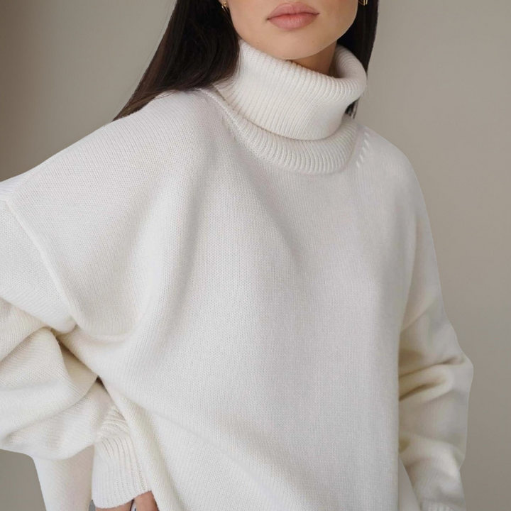 "Pull col roulé femme élégant pour hiver, design moderne, manches longues, tissu doux et respirant, look tendance."