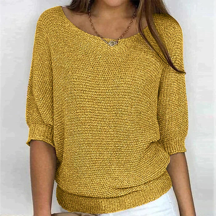 "Pull élégant femme rose en maille douce, coupe flatteuse, parfait pour un style chic et confortable."