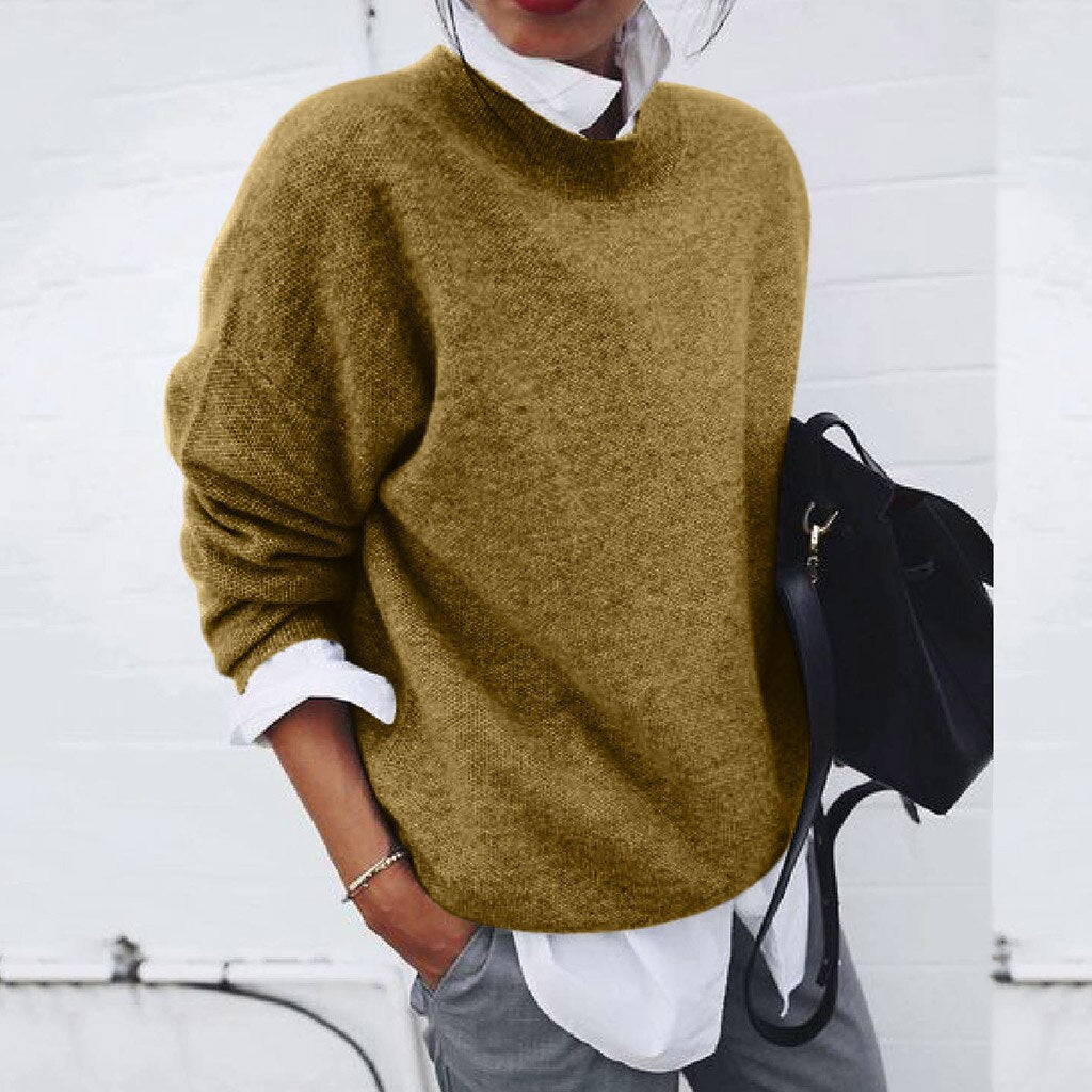 "Pull en cachemire doux pour femme, couleur neutre, design classique et élégant, tissu luxueux et confortable pour l'hiver."