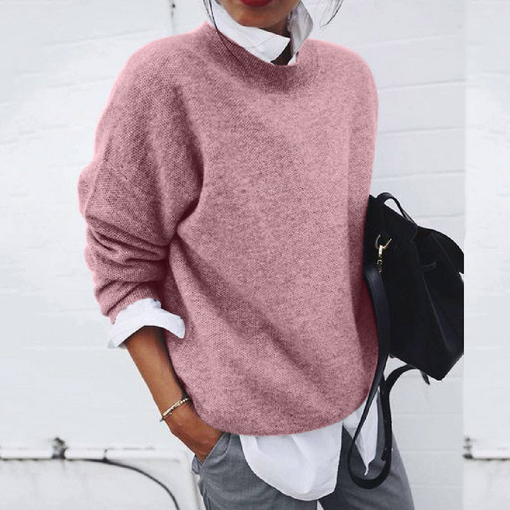 "Pull en cachemire doux pour femme, couleur neutre, design classique et élégant, tissu luxueux et confortable pour l'hiver."