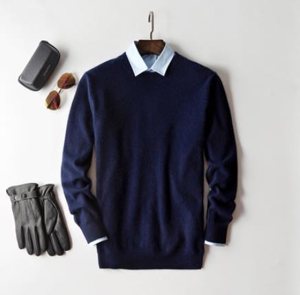 Pull en cachemire pour homme, couleur unie, texture douce, col rond, manches longues, élégance et confort haut de gamme.