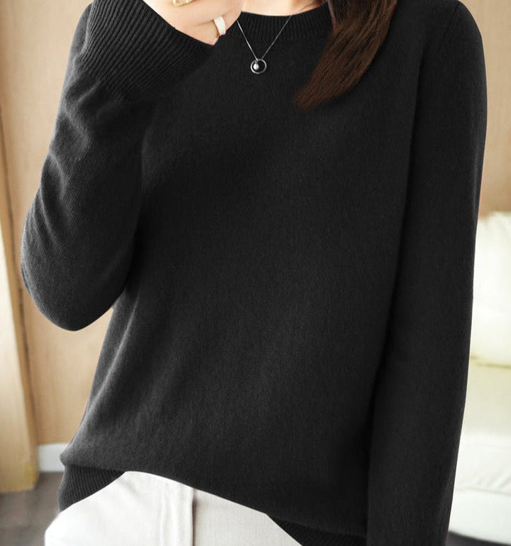 "Pull en laine mérinos pour femmes en beige, manches longues, design élégant, douceur luxe idéale pour l'hiver."
