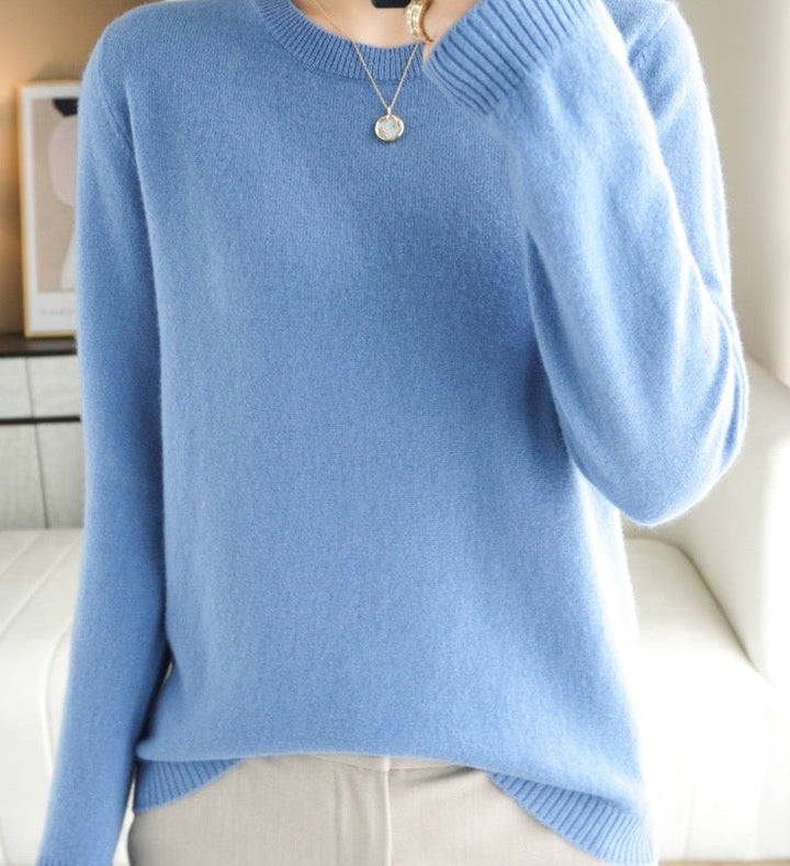 "Pull en laine mérinos pour femmes en beige, manches longues, design élégant, douceur luxe idéale pour l'hiver."