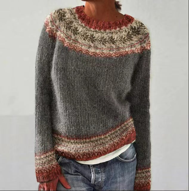 "Pull femme coloré en maille douce, manches longues, coupe confortable, motif multicolore, idéal pour l'automne-hiver."