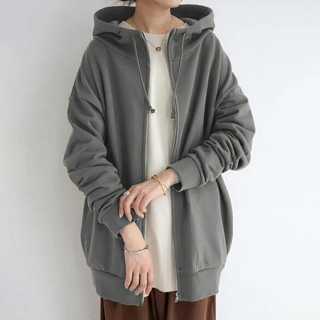 "Pull femme hiver avec capuche, doux et chaud, design élégant, couleur neutre, parfait pour les tenues hivernales."