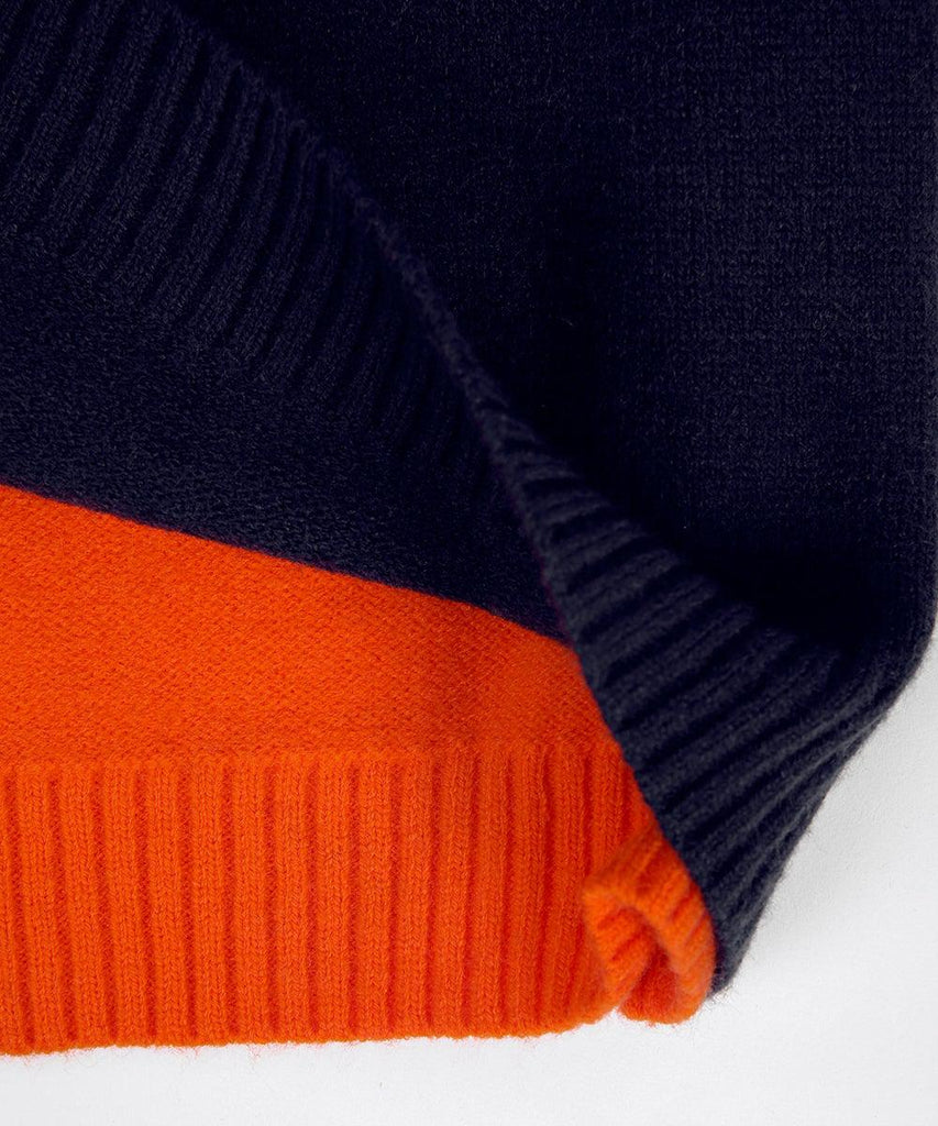 "Pull femme rayé marine et orange, design rétro color-block, coton doux, coupe classique et élégante."