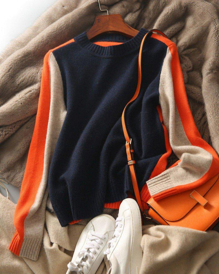 "Pull femme rayé marine et orange, design rétro color-block, coton doux, coupe classique et élégante."