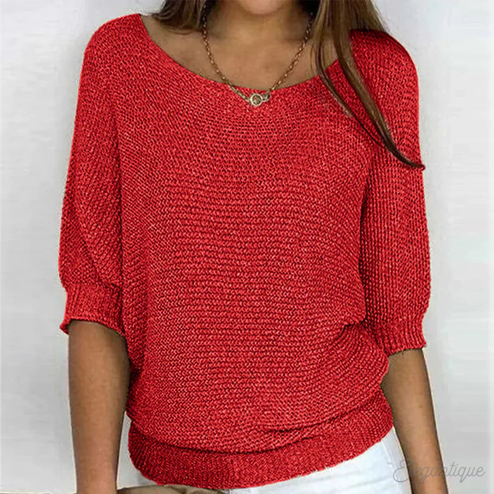 "Pull-over femme en maille croisée, élégant et confortable, texture douce, finitions délicates, style polyvalent."