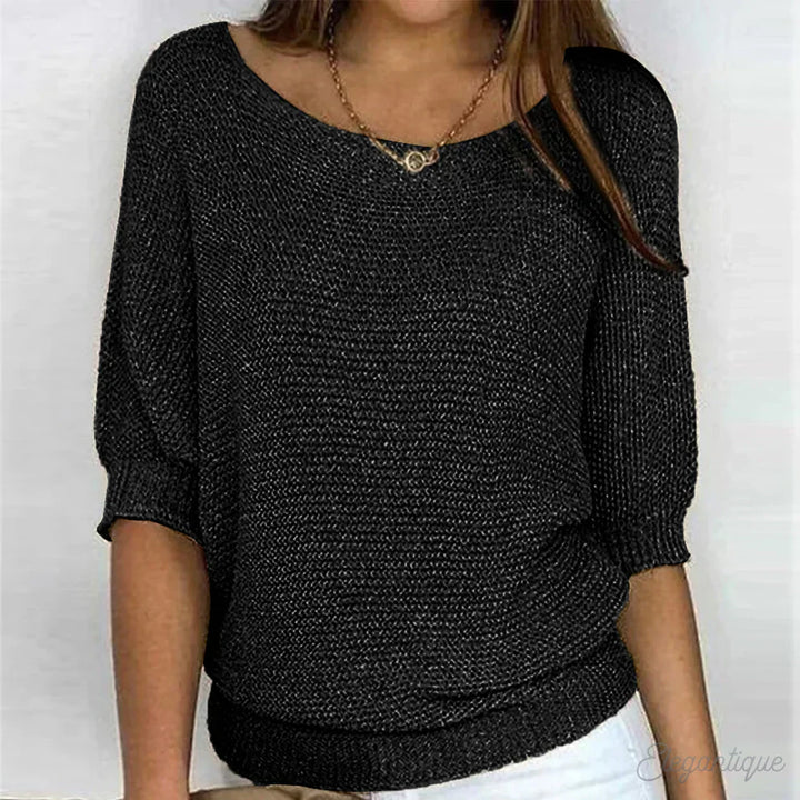 "Pull-over femme en maille croisée, élégant et confortable, texture douce, finitions délicates, style polyvalent."
