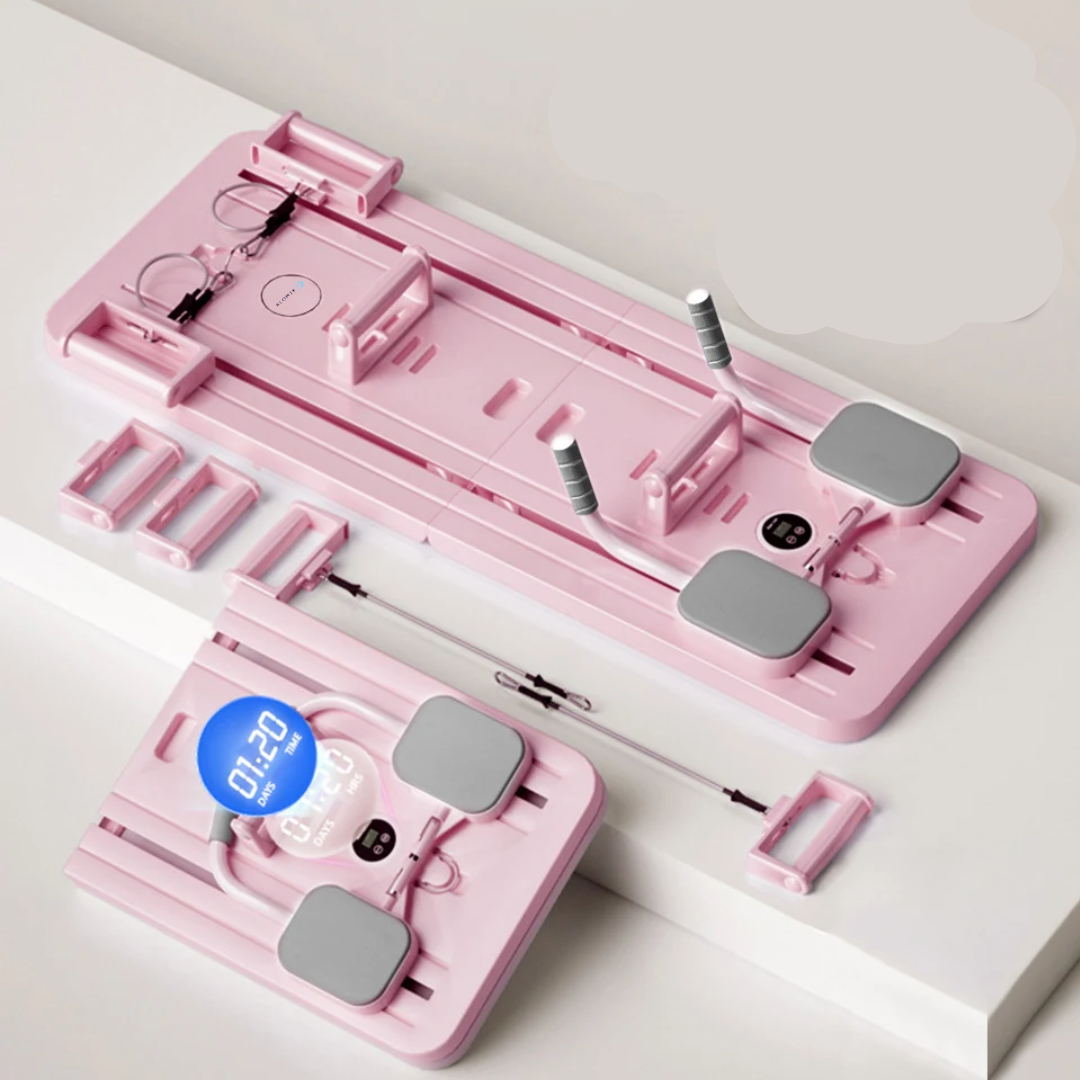 Réformateur Pilates compact noir pour maison, tonification et souplesse, élastiques résistants, usage débutant à avancé.