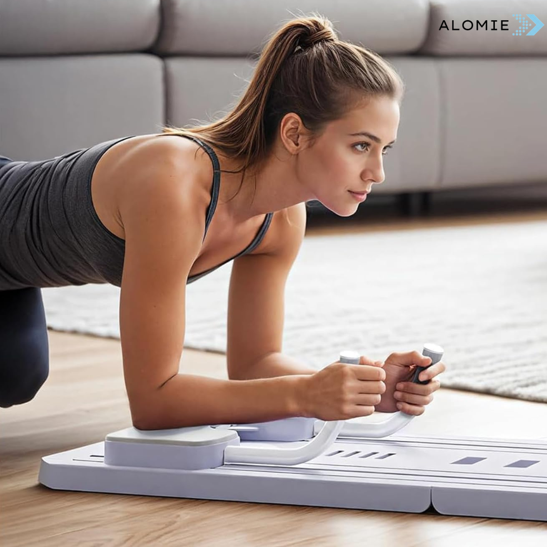 Réformateur Pilates compact noir pour maison, tonification et souplesse, élastiques résistants, usage débutant à avancé.