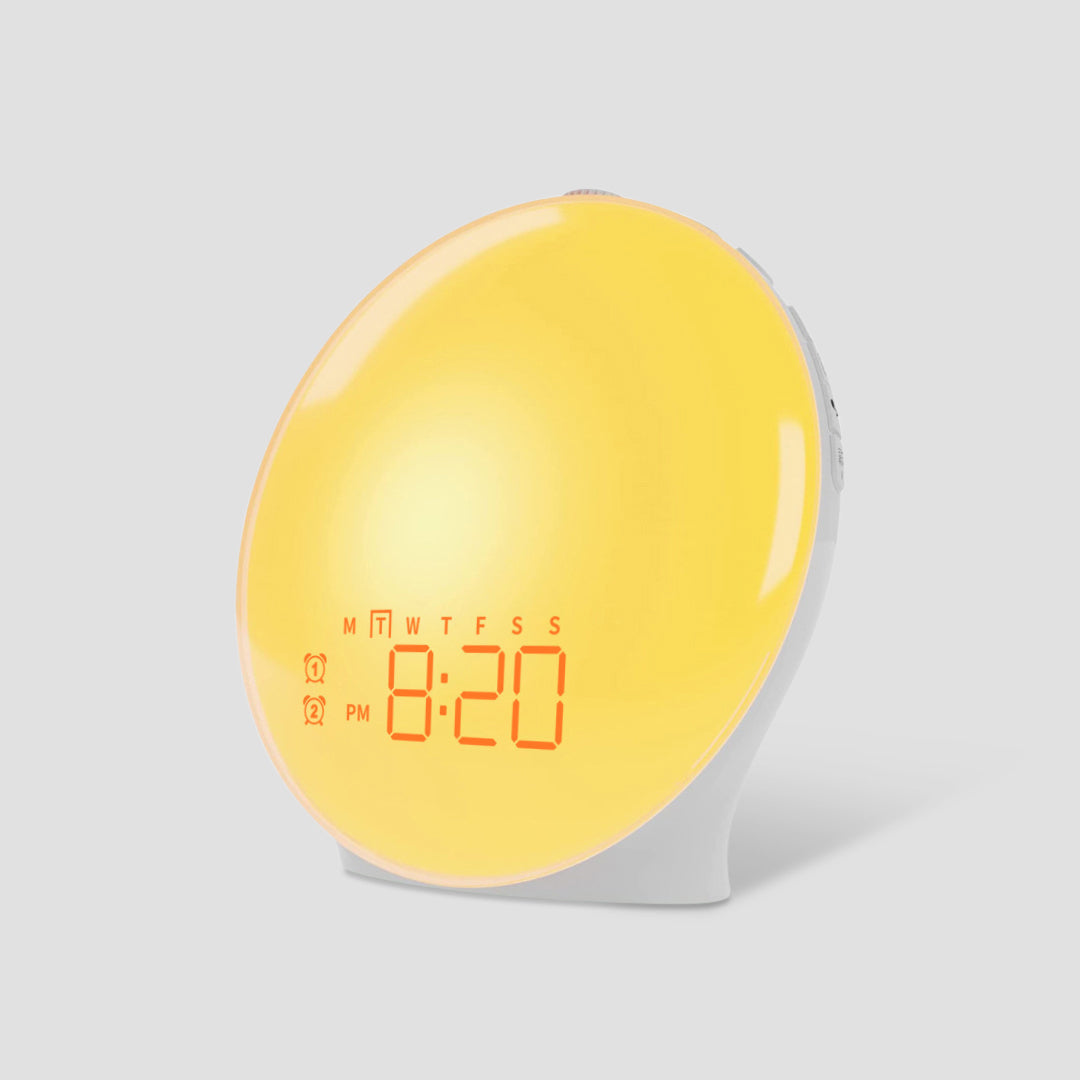 "Réveil lumière naturelle moderne, design élégant, mode veilleuse, sons apaisants, simulation lever soleil, déco maison."