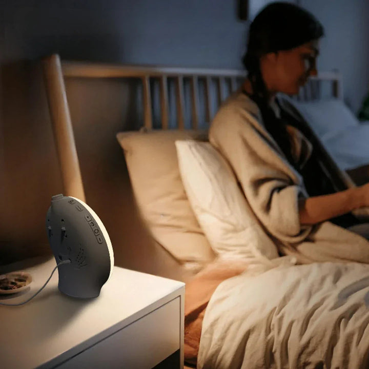 "Réveil lumière naturelle moderne, design élégant, mode veilleuse, sons apaisants, simulation lever soleil, déco maison."