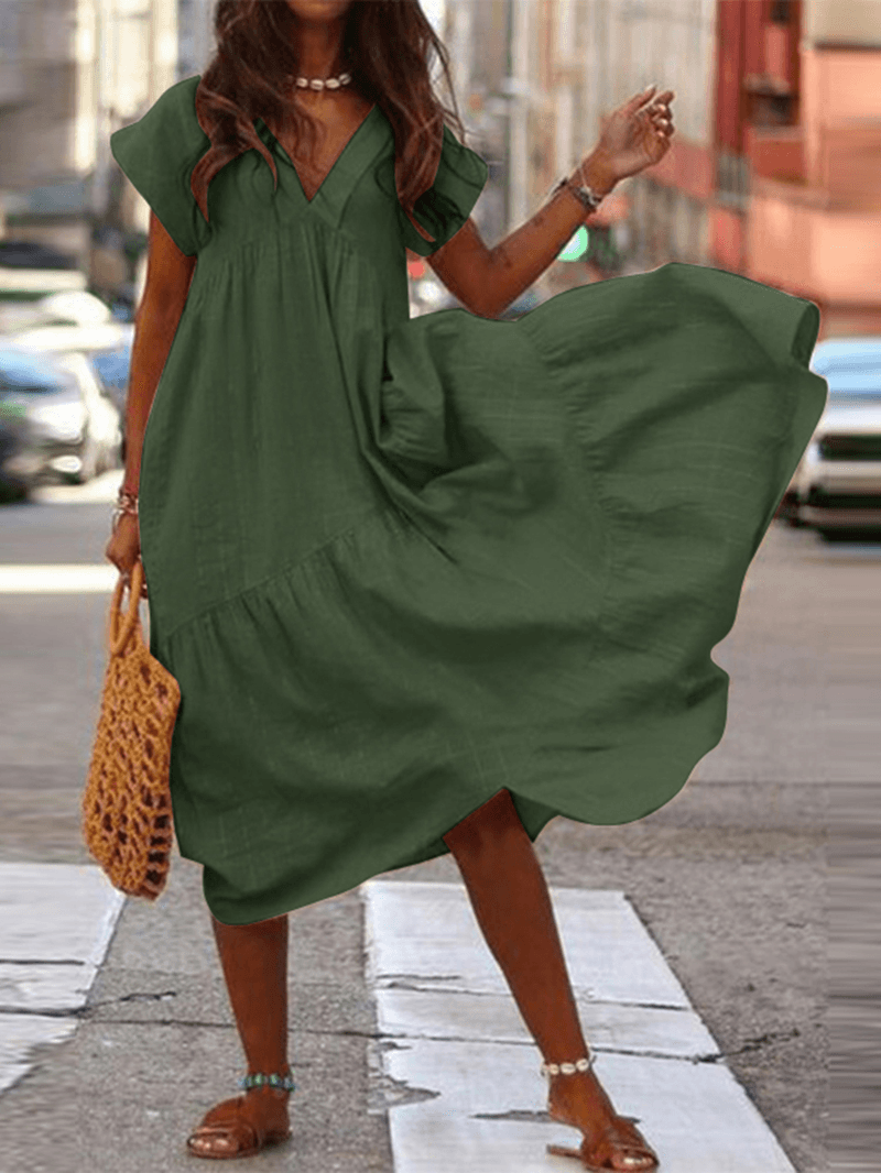 "Robe ample en coton pour femmes avec col V, design fluide et décontracté, idéal pour un look élégant et confortable."