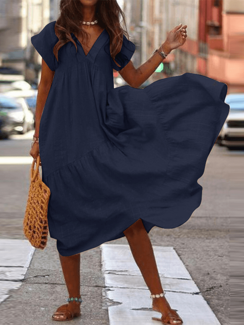 "Robe ample en coton pour femmes avec col V, design fluide et décontracté, idéal pour un look élégant et confortable."