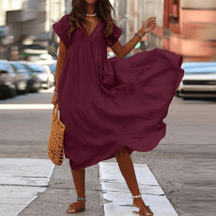 "Robe ample en coton pour femmes avec col V, design fluide et décontracté, idéal pour un look élégant et confortable."