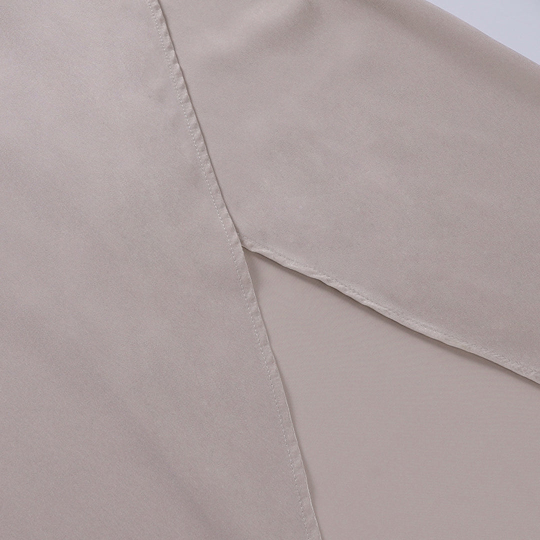 "Robe asymétrique élégante Andrea en noir, ourlet moderne, tissu somptueux pour occasions formelles, tailles S-3XL."